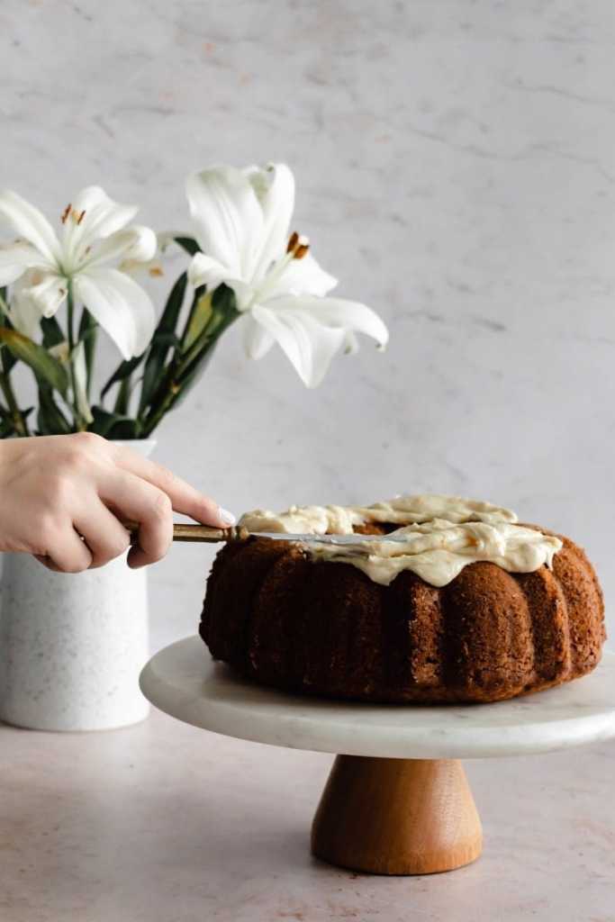 frosting the toasted carrot bundt cake