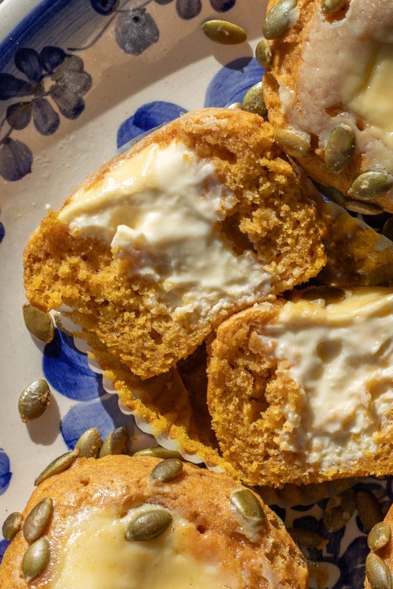 Close up cross-section of the pumpkin cheesecake muffins.