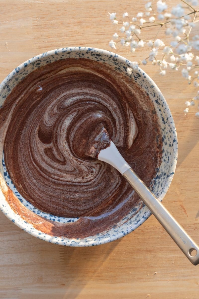 The chocolate mixture and egg mixture swirled together.