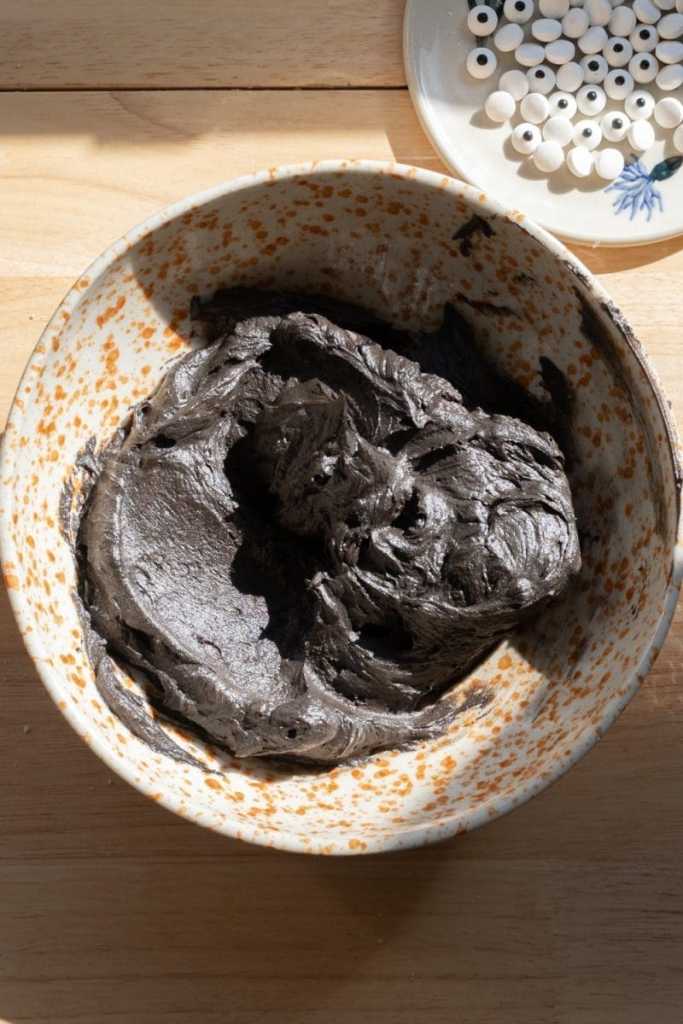 The black cocoa buttercream in a mixing bowl.