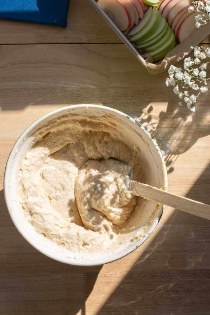 The finished cake batter in a mixing bowl.