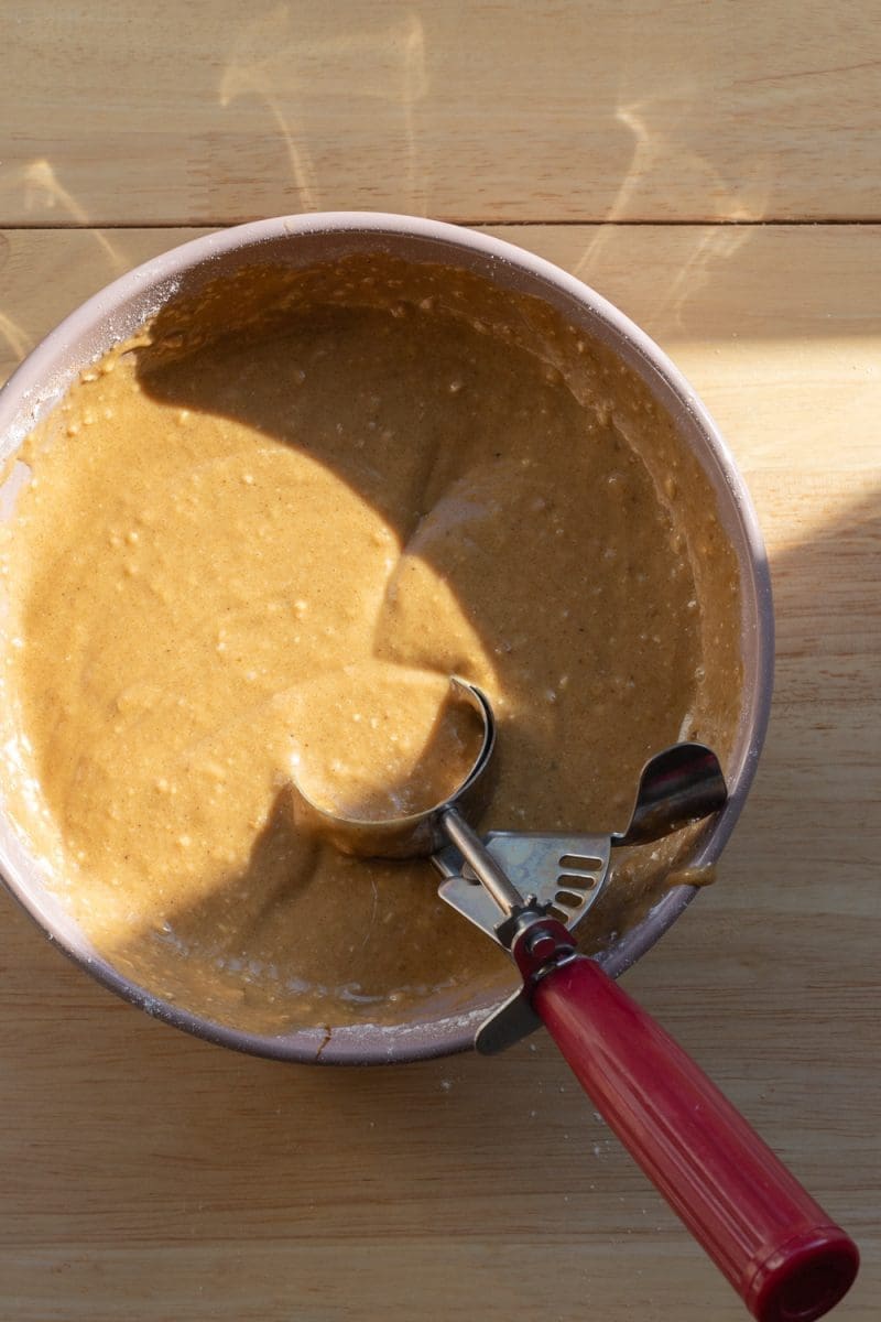 The finished cupcake batter in a mixing bowl.