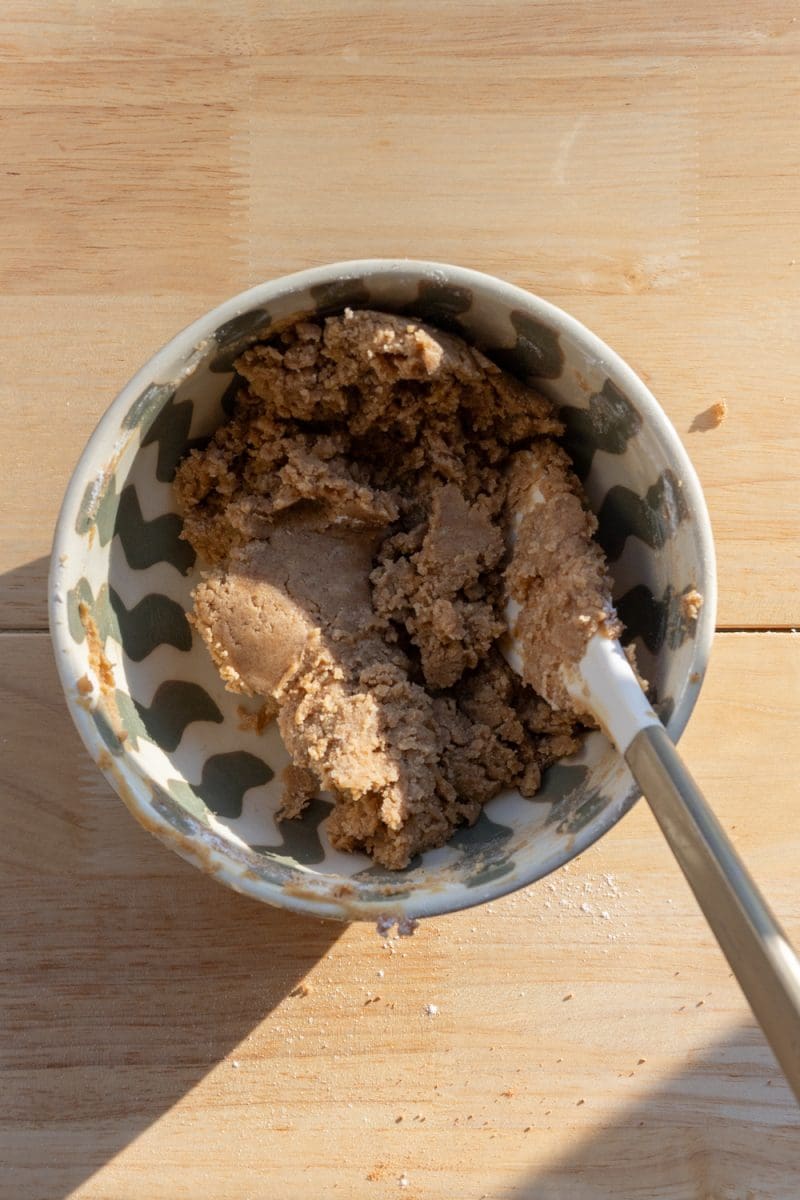 The finished cookie dough in a mixing bowl.