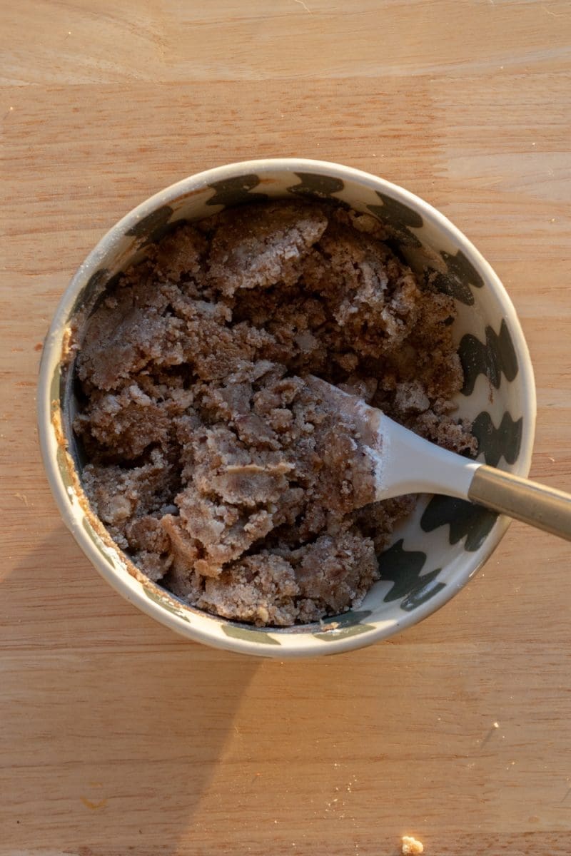 The streusel in a mixing bowl.