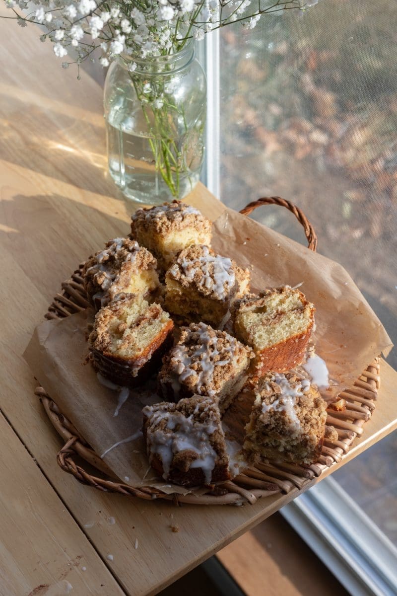 Small batch coffee cake cut in slices on a tray.
