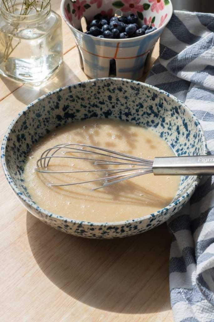 The wet ingredients whisked together in a small mixing bowl.