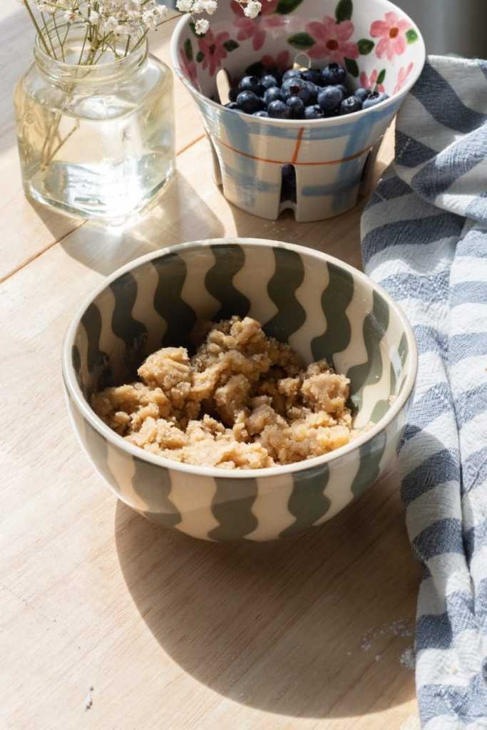The streusel in a small mixing bowl.