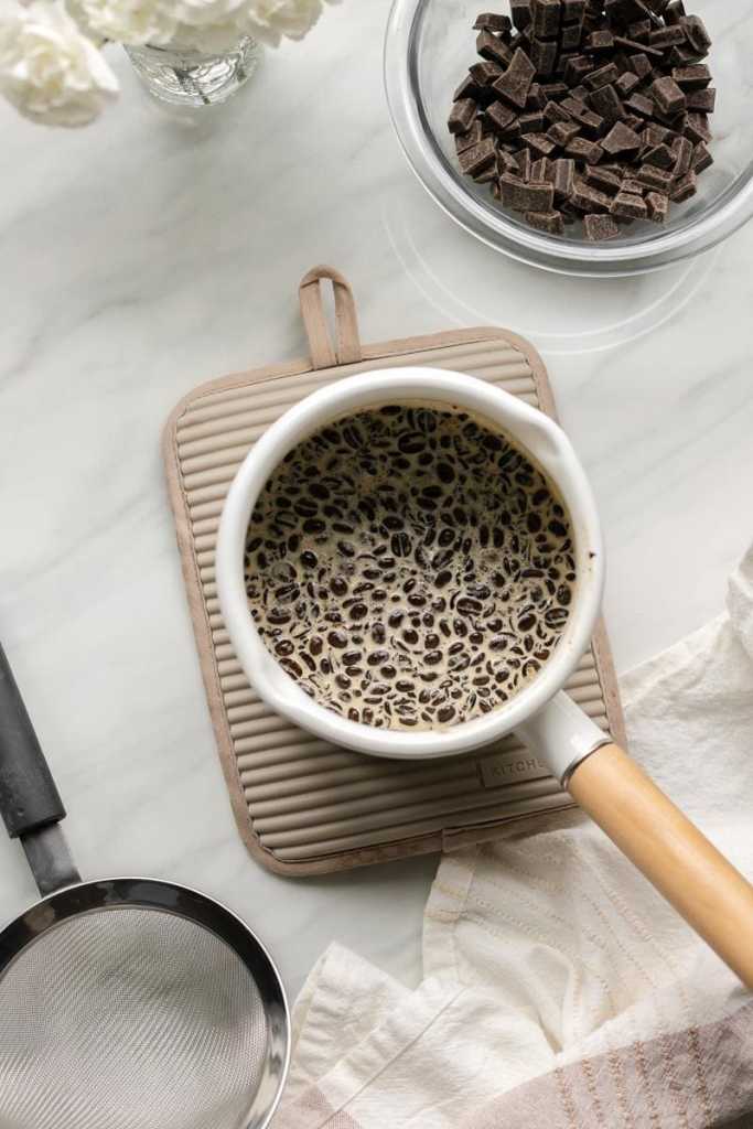 espresso beans steeping in heavy cream