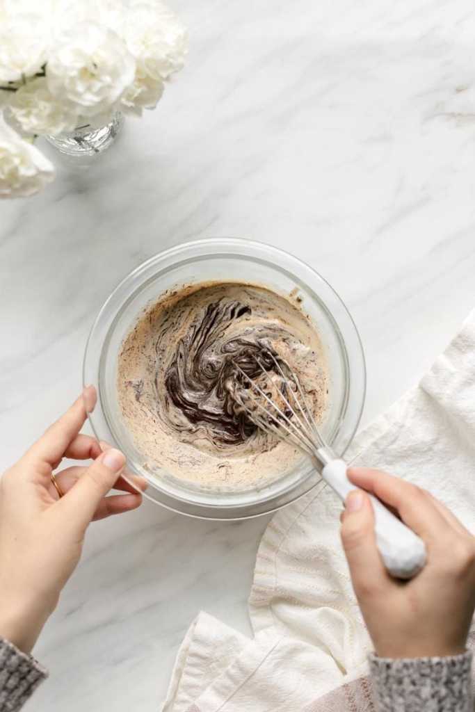 whisking the cream and chocolate together