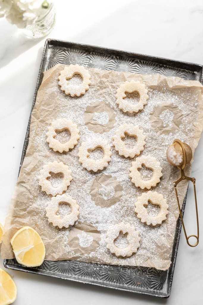 the tops of the cookies, dusted with powdered sugar