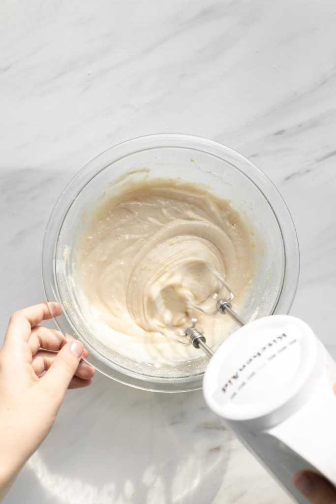 beating the wet ingredients into the dry ingredients