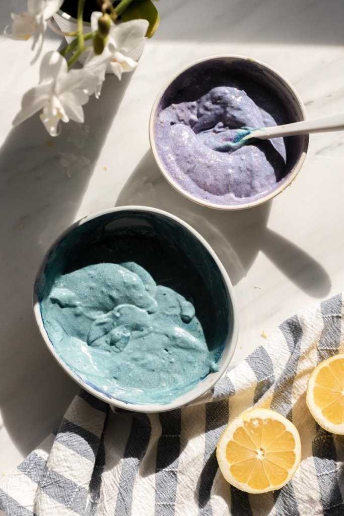 A bowl of the blue and purple batters