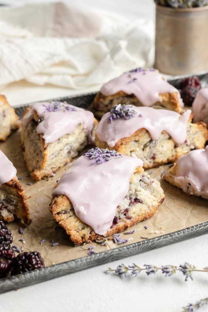 a straight on view of the blackberry lavender scones, showing how tall they are