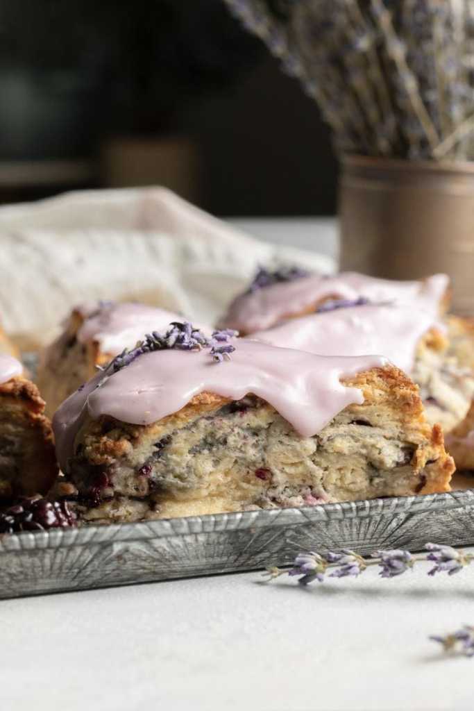 a straight on view of the blackberry lavender scones, showing how tall they are