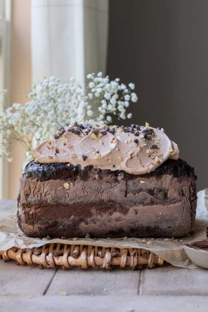 Side view of the whole chocolate hazelnut ice cream cake.