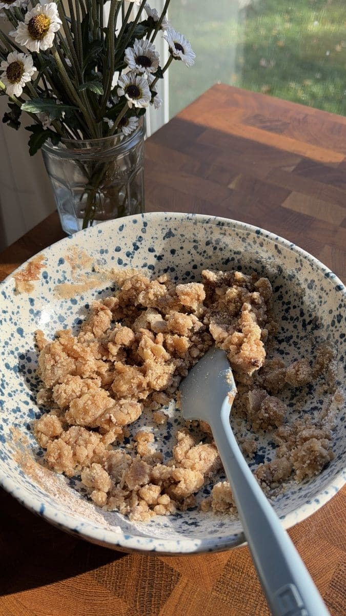 Shortbread crumbles in a mixing bowl.
