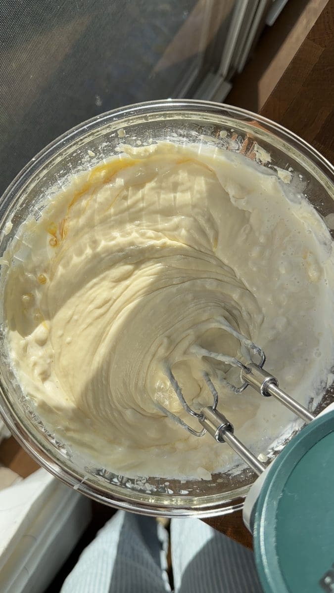 The cream cheese, sugar, and cornstarch beaten together in a mixing bowl.