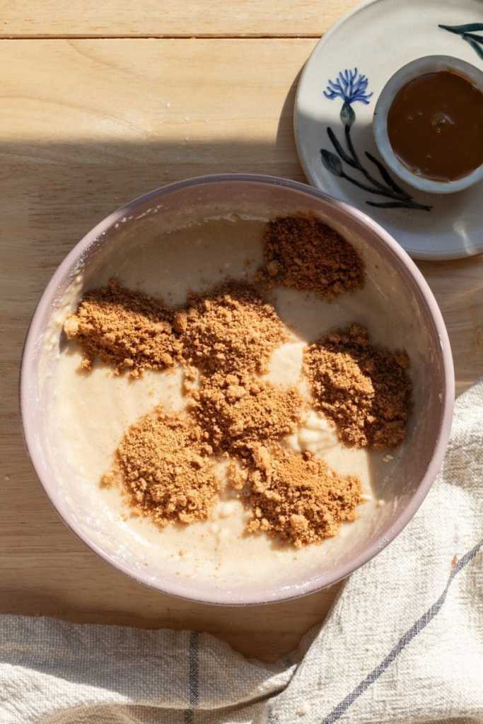 Chai spice dollops on top of the cupcake batter.