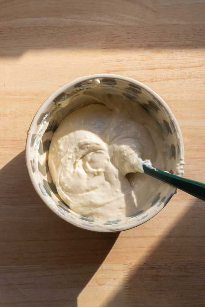 The cream cheese filling in a mixing bowl.