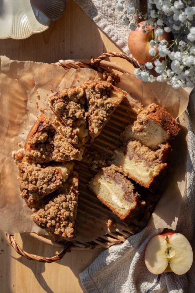 Overlooking the cream cheese apple crumb cake, sliced.