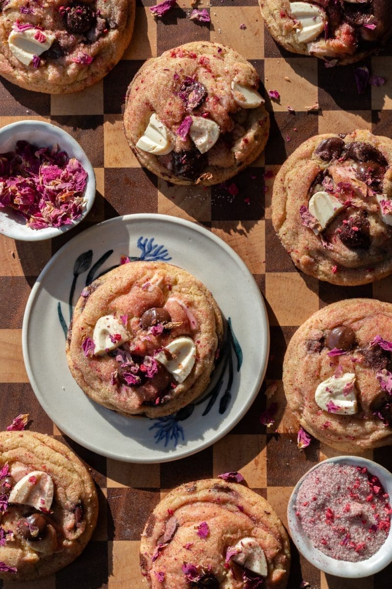 Rose chocolate chip cookies stylized on a tray.