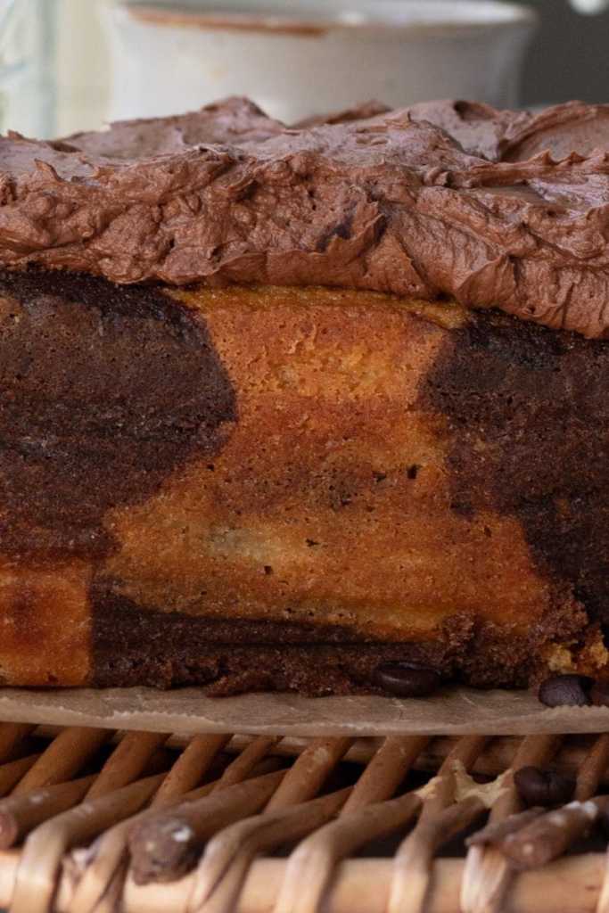 Close-up of the espresso marbled loaf cake topped with espresso ganache.