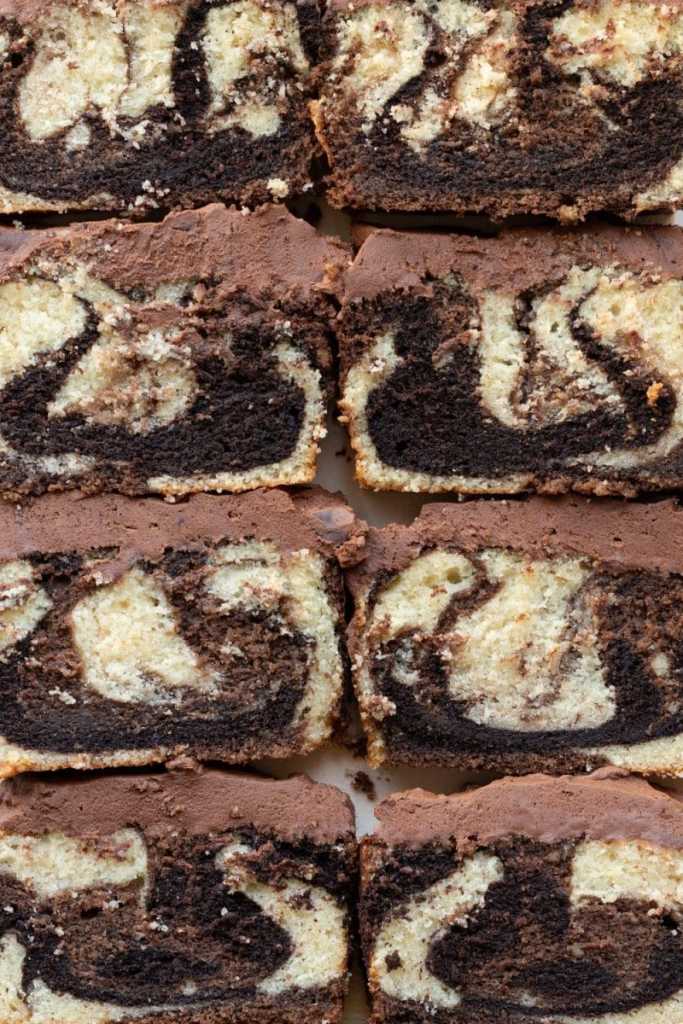 Flat lay of slices of the espresso marbled loaf cake all next to each other