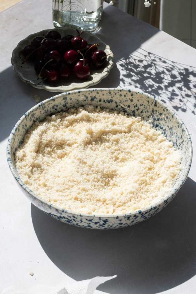 The mixing bowl after beating together the butter and dry ingredients.
