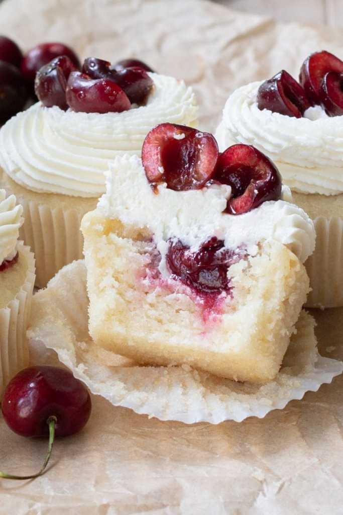 close up of the inside of the white chocolate cherry cupcakes