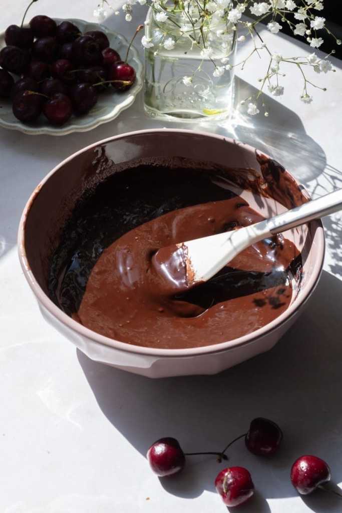 The mixing bowl after mixing together the butter, chocolate and cocoa.