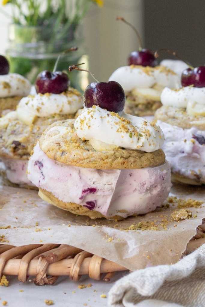 close up of one of the pistachio cookie ice cream sandwiches