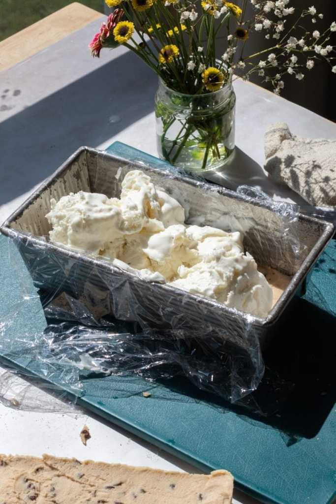 Layering the ice cream into the loaf pan.