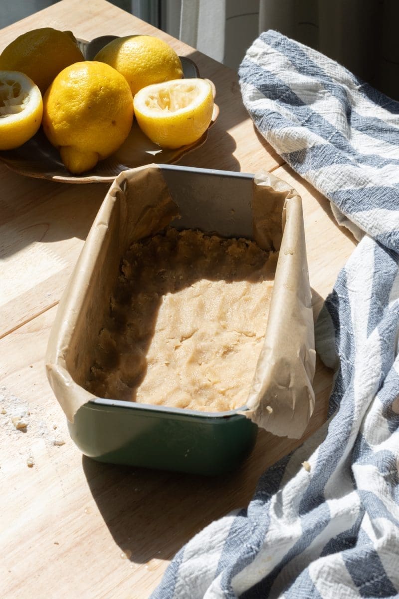 The shortbread pressed into a loaf pan.