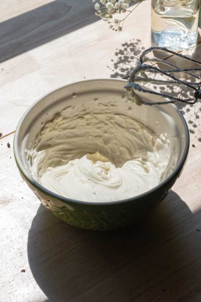The cream cheese, sugar and salt beaten together in a mixing bowl.