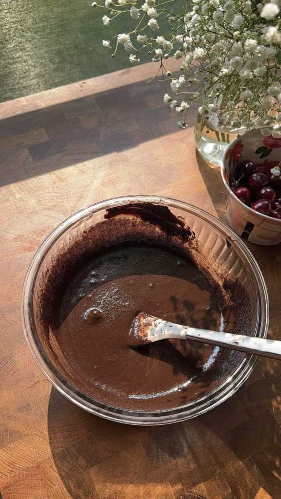 Mixing together the brownie batter.