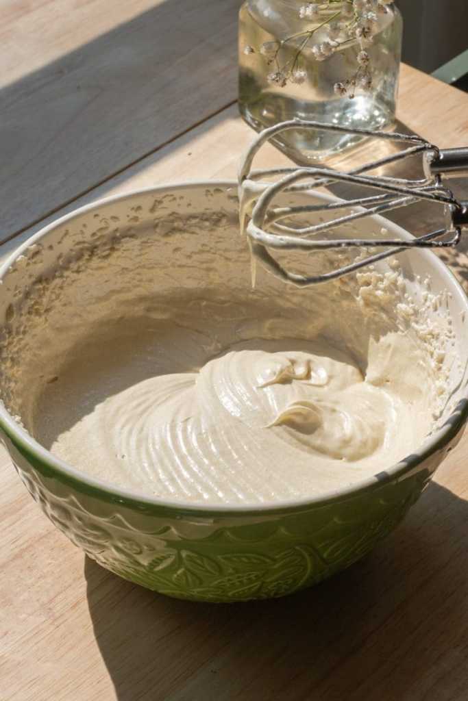 Mixing bowl with the butter, oil, sugar, eggs and vanilla beaten together.
