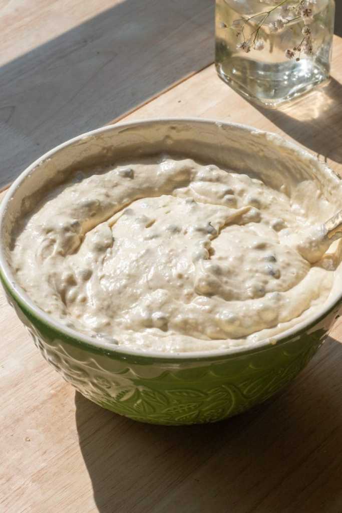 The finished vanilla loaf cake batter in a mixing bowl.