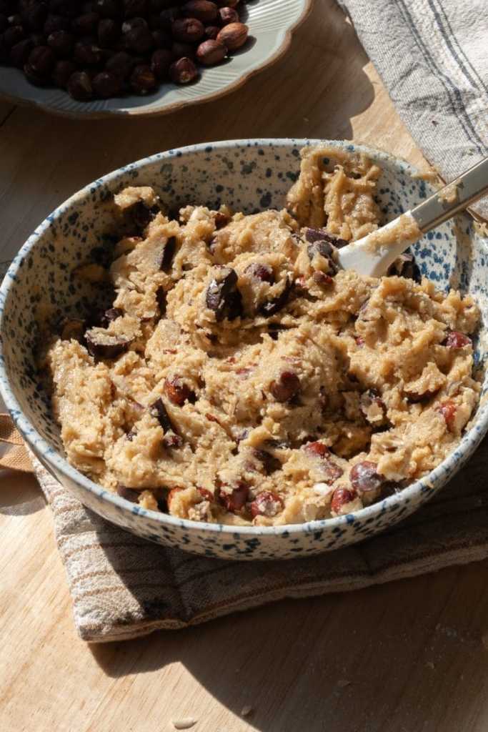 The hazelnut chocolate chip cookie dough finished in a mixing bowl.