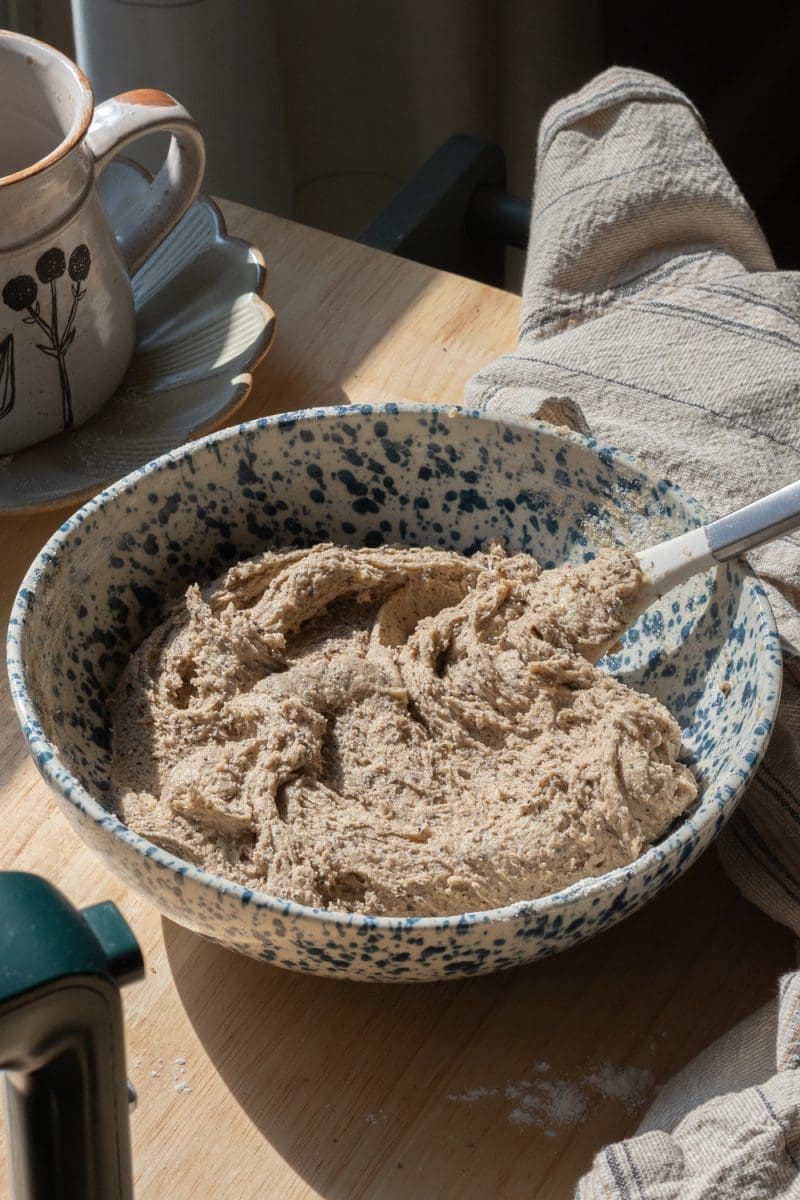 The finished cookie dough in a mixing bowl.
