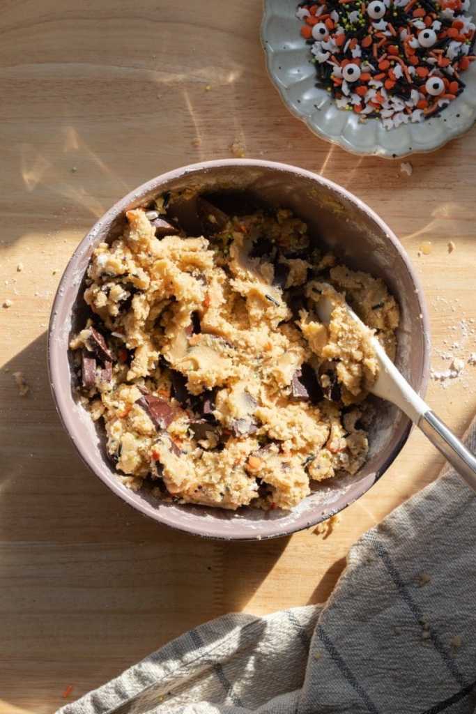 The finished cookie dough in a mixing bowl.