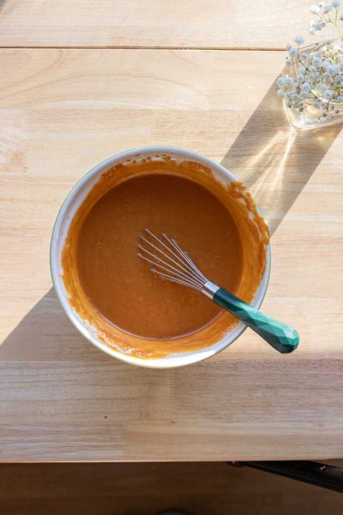 The wet ingredients of the pumpkin bread mixed together.