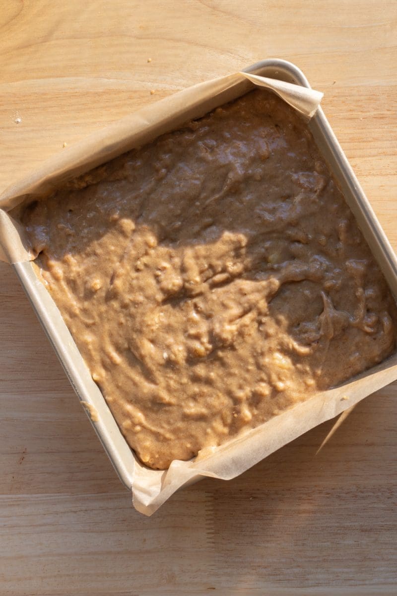 The cake batter in a baking pan.