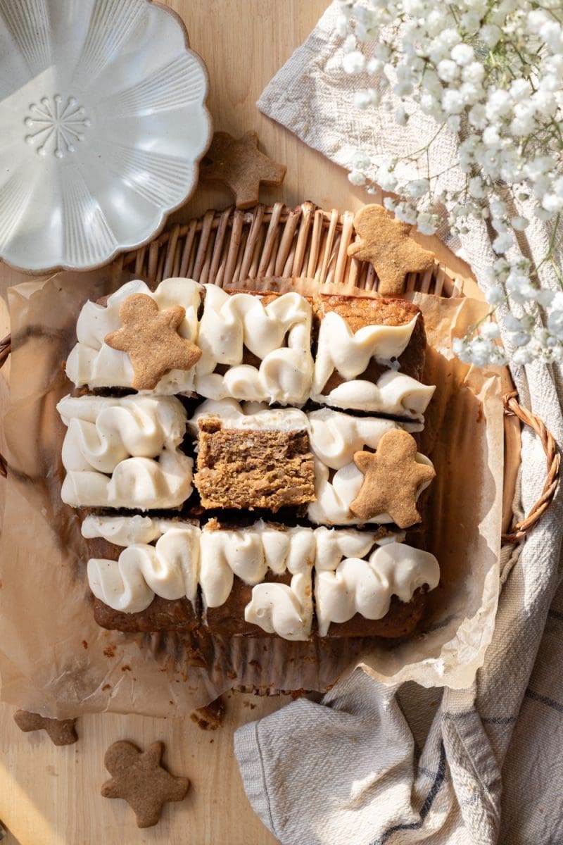Gingerbread banana sheet cake sliced with one slice facing up towards the camera.