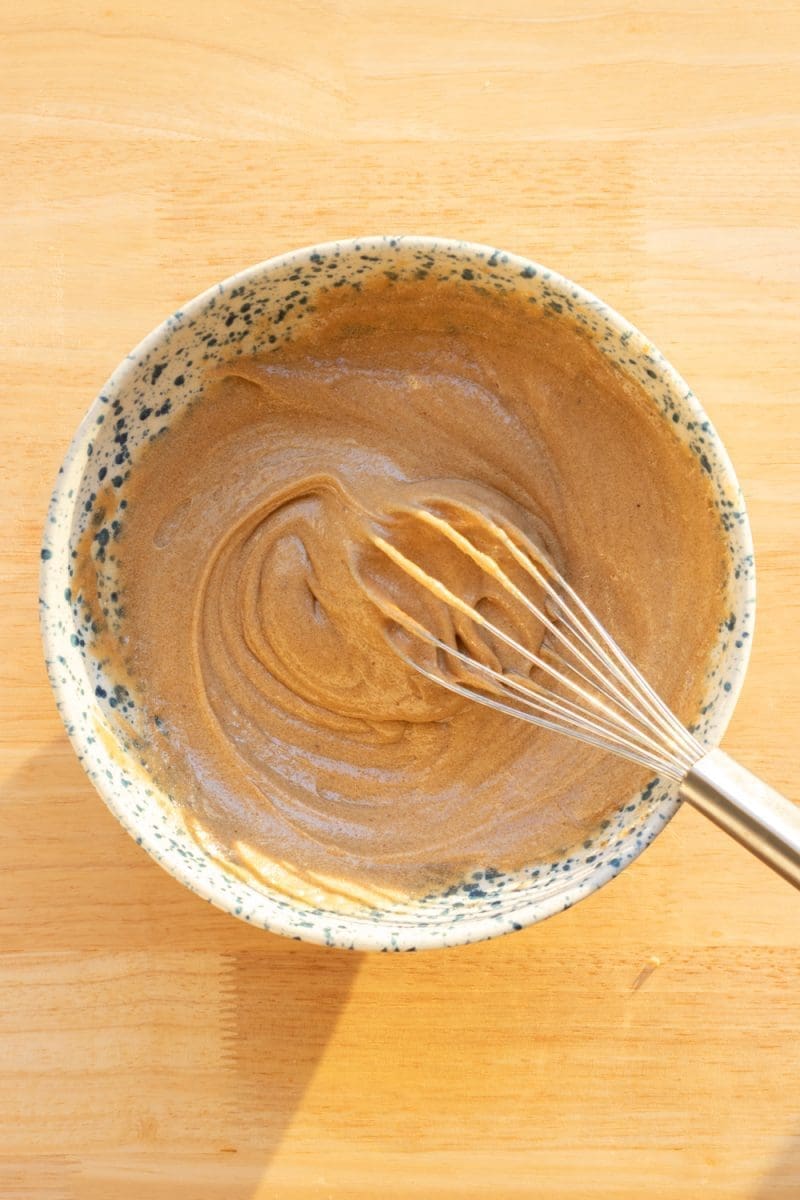 The wet ingredients for the cookie dough whisked together.