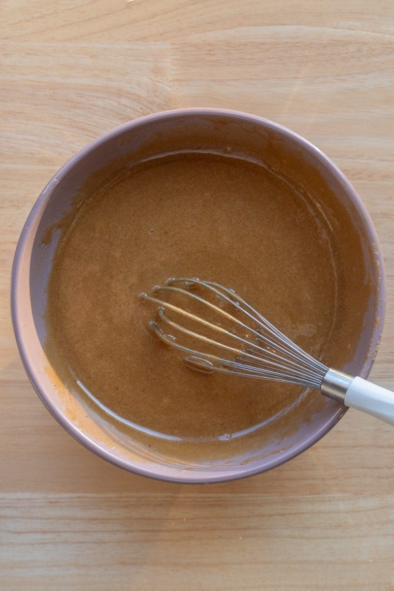 The wet ingredients for the gingerbread dough whisked together.
