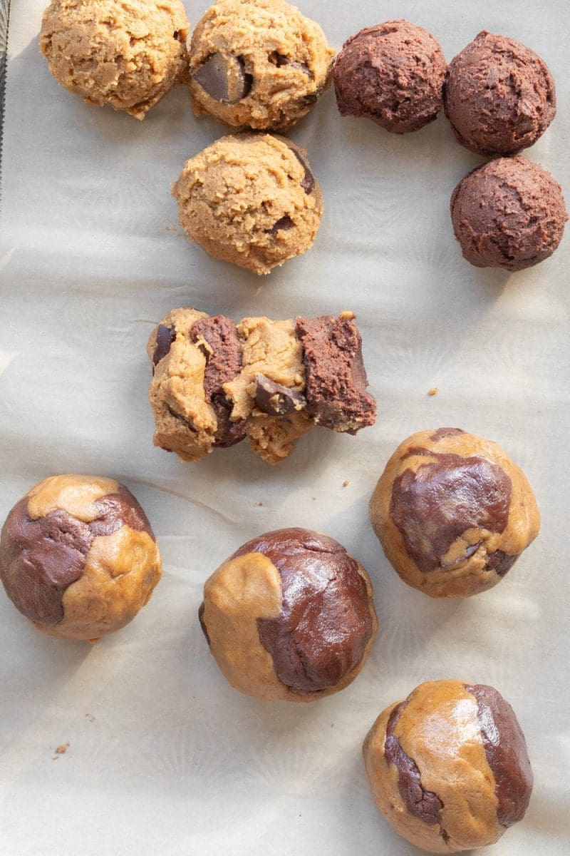 Marbling the cookie doughs together.