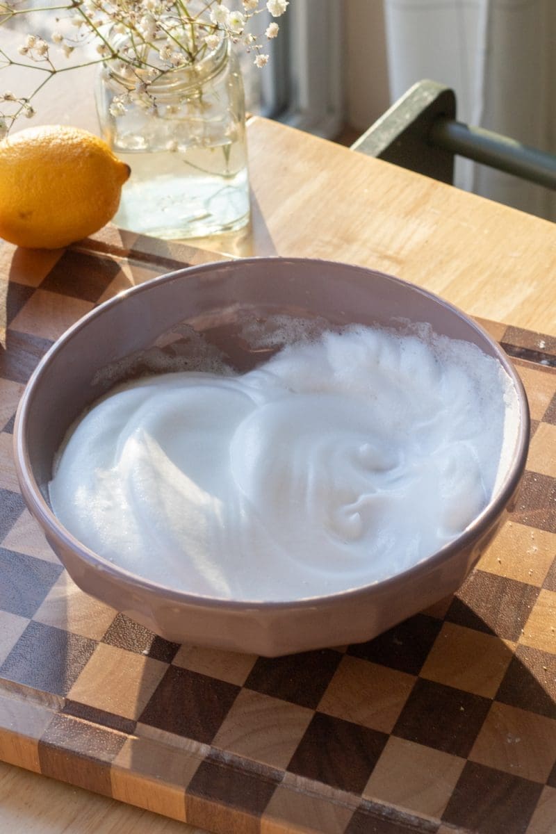 Whipped egg whites in a mixing bowl.