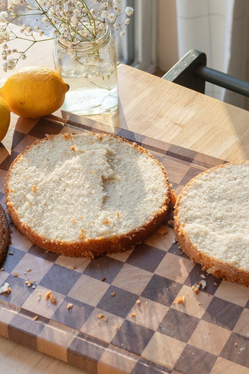 Sliced cake layers on a cutting board.