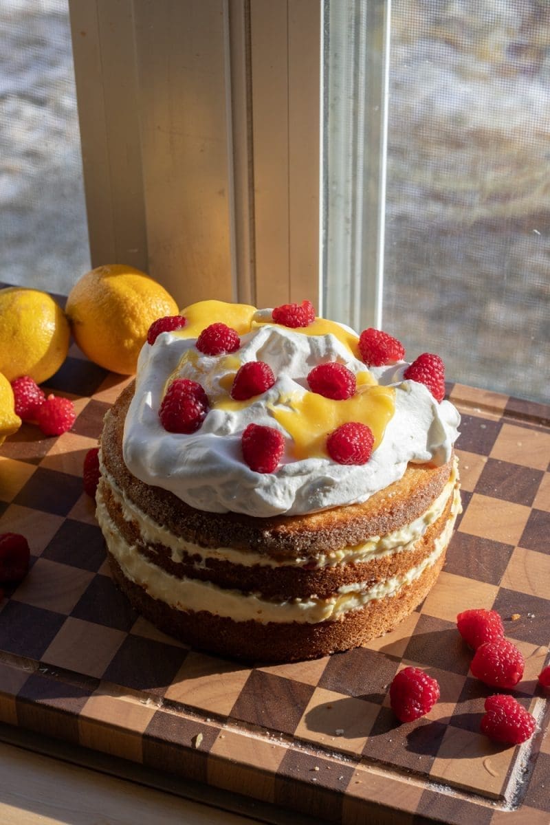 Close up of the fully assembled lemon raspberries and cream cake.