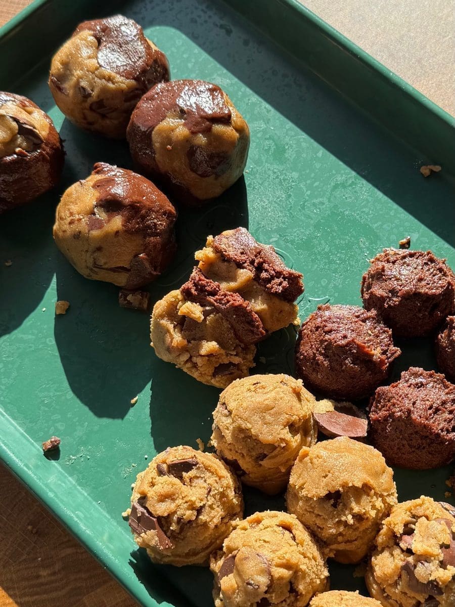 Layering the doughs together.